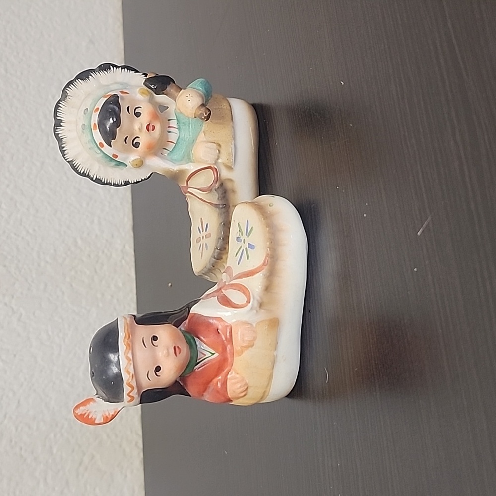 Vintage Native American little girls in moccasins salt and pepper shakers.